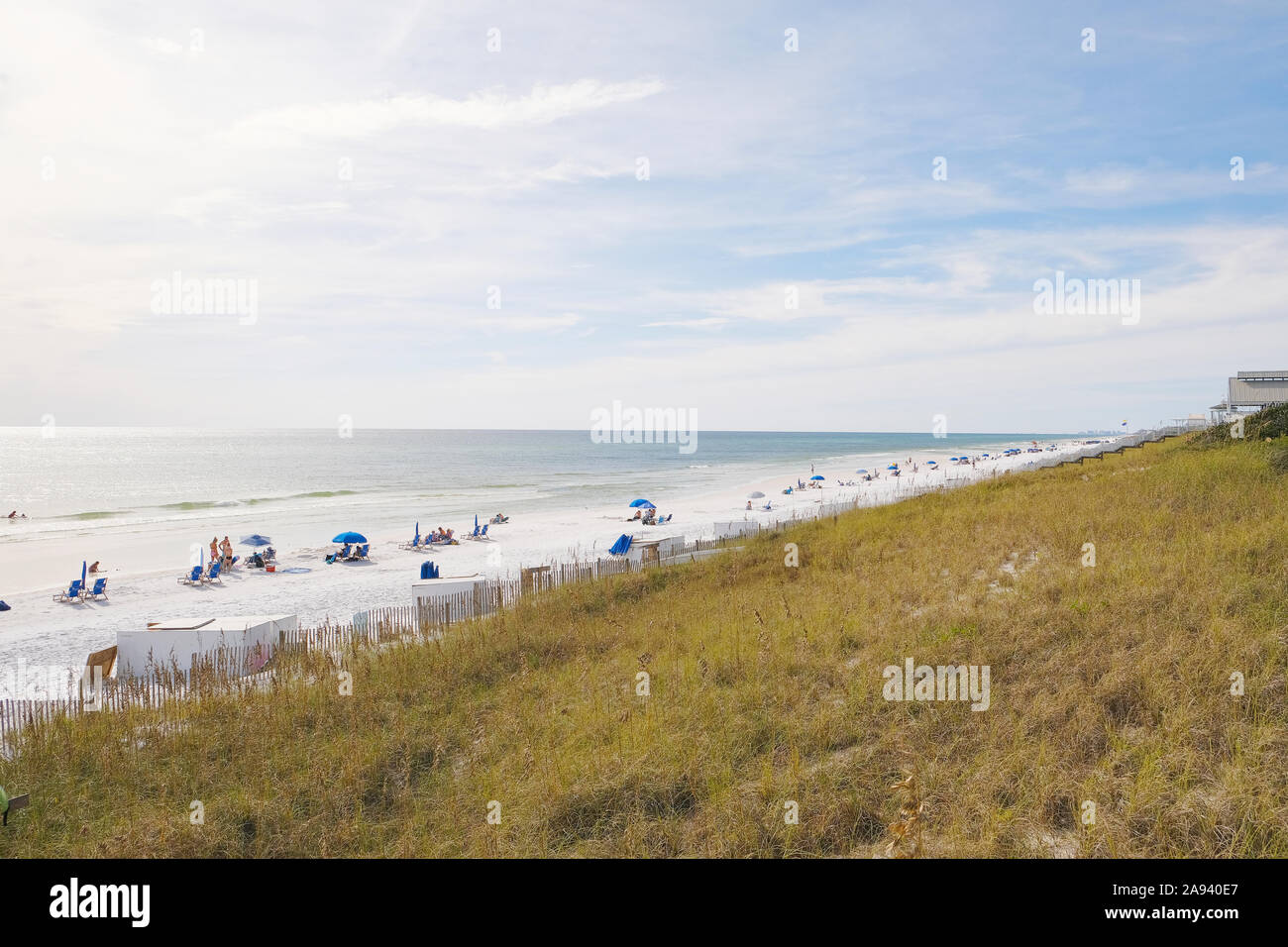 People and families enjoying the white sand beach and beaches of the Florida panhandle, Gulf of Mexico, in Seaside Florida, USA. Stock Photo