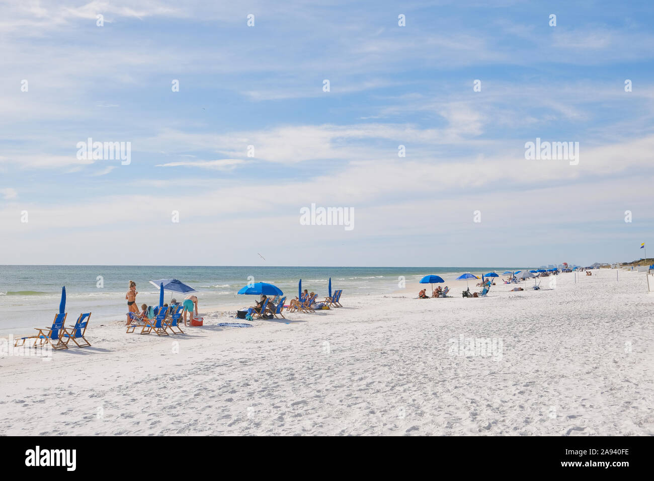 People and families enjoying the white sand beach and beaches of the Florida panhandle, Gulf of Mexico, in Seaside Florida, USA. Stock Photo