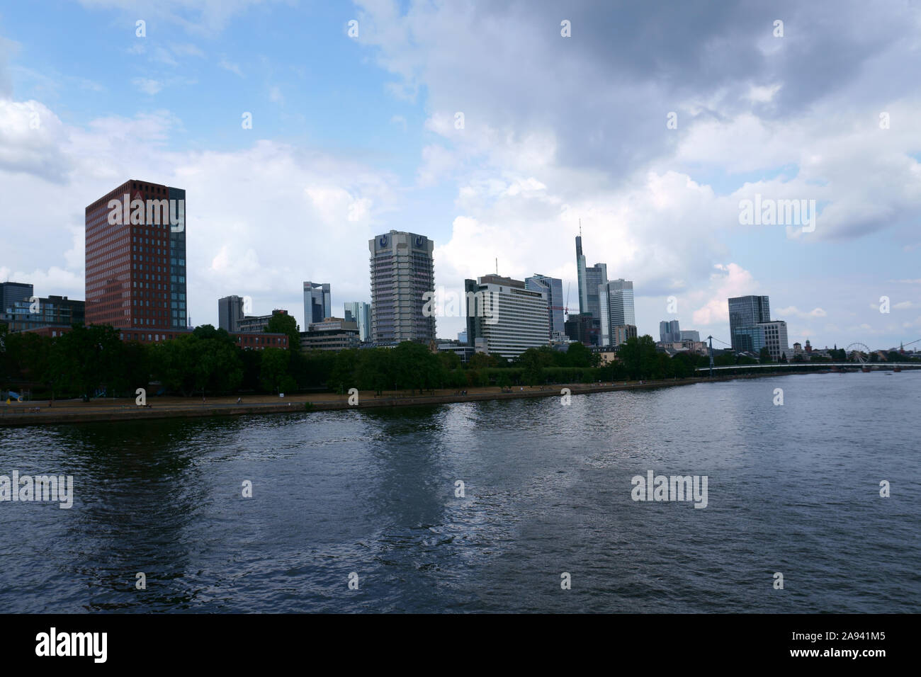 Various skyscrapers and office buildings behind the river Main in Frankfurt. Stock Photo