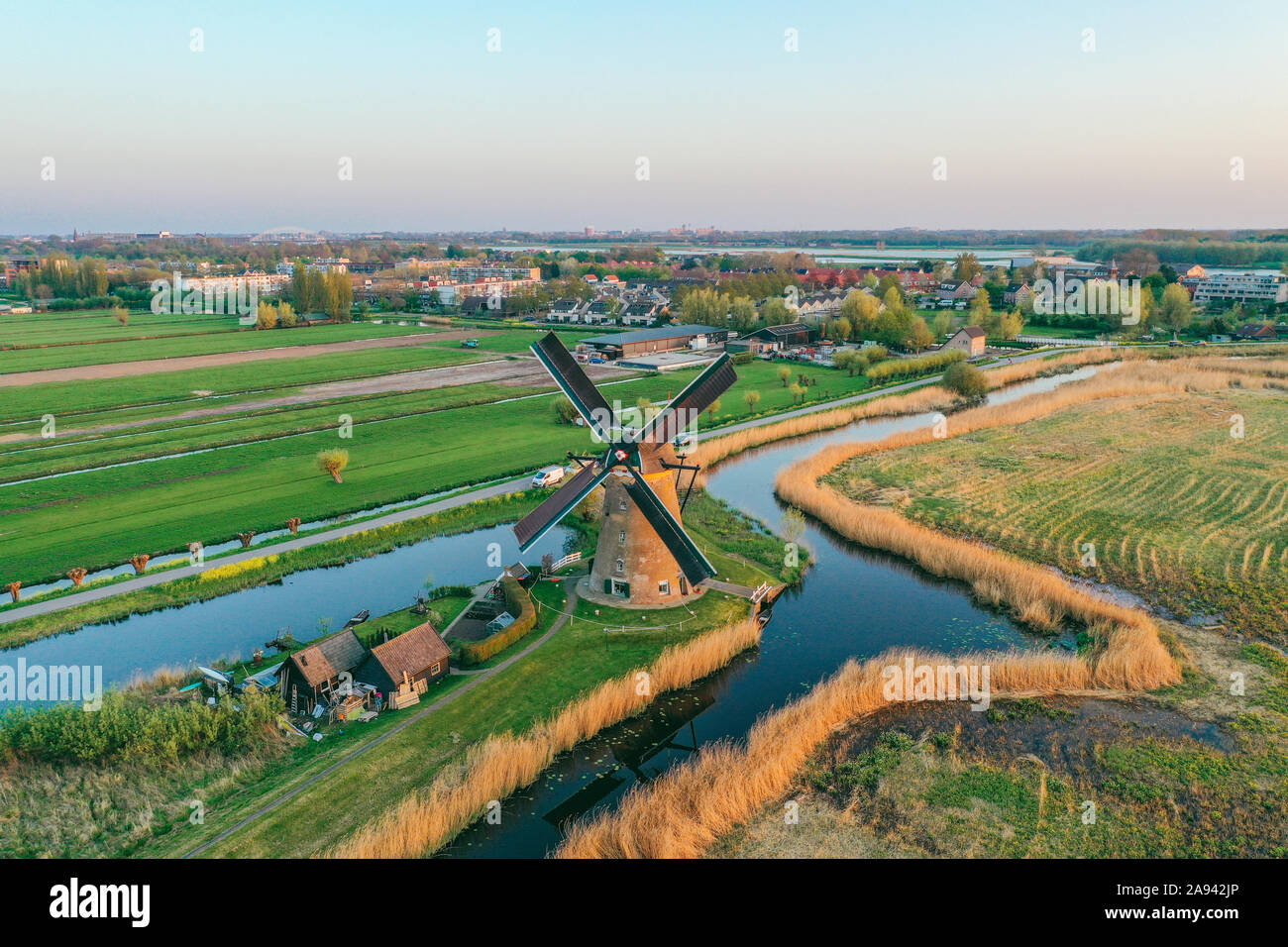 Aerial drone shot view of Kinderdijk Wind Mills in the filed near Rotterdam  in Netherlands Stock Photo - Alamy