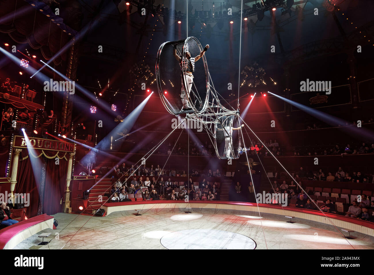Paris, France. 9th Nov, 2019. Duo Shock, Sonny and Petrica on the wheel of death perform during the show 'Défi' of Cirque Bouglione. Stock Photo