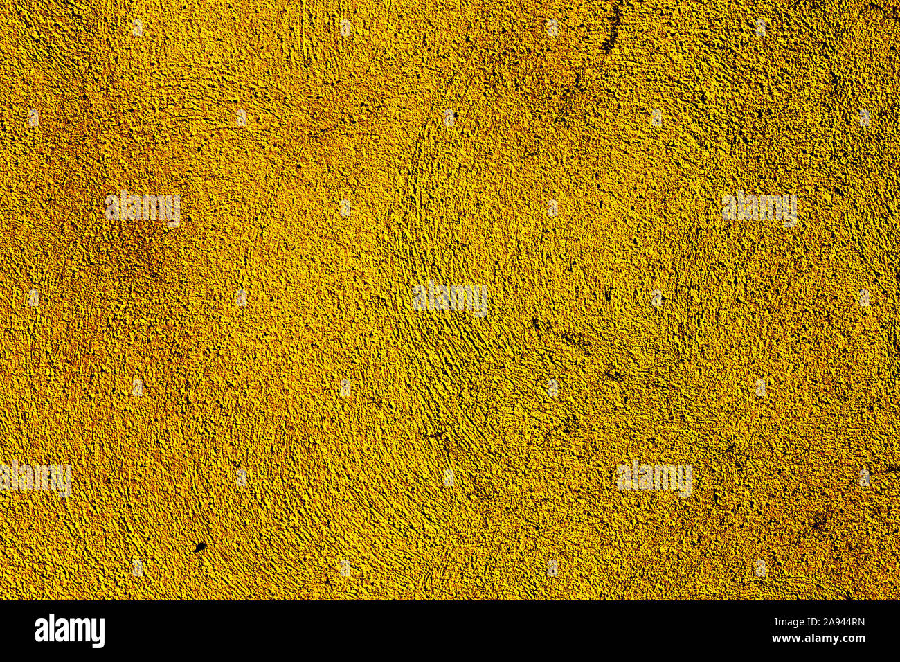 Yellow colored background with textures of different shades of yellow and orange Stock Photo