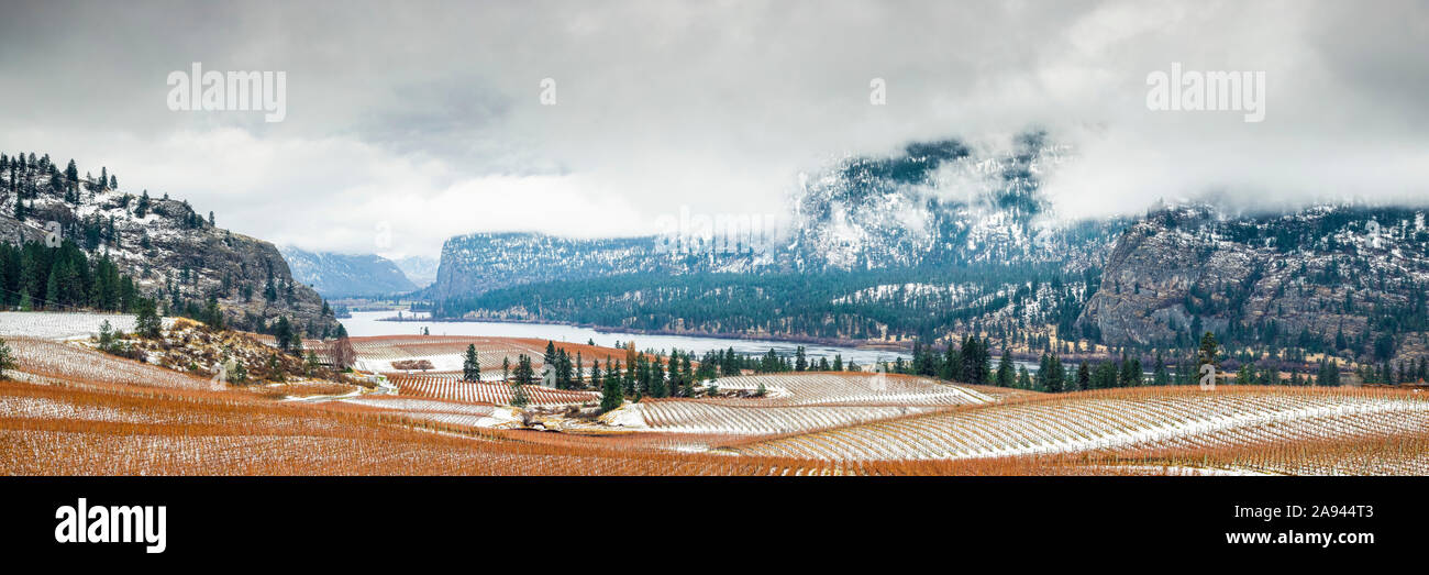 Multi-stitch panorama of the Cascade Mountains in the Okanagan Valley in autumn with early snow; British Columbia, Canada Stock Photo