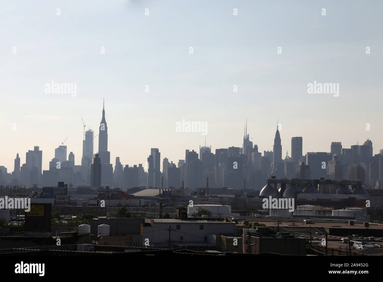 Manhattan skyline with Empire State, Chrysler  Buildings from Brooklyn Stock Photo
