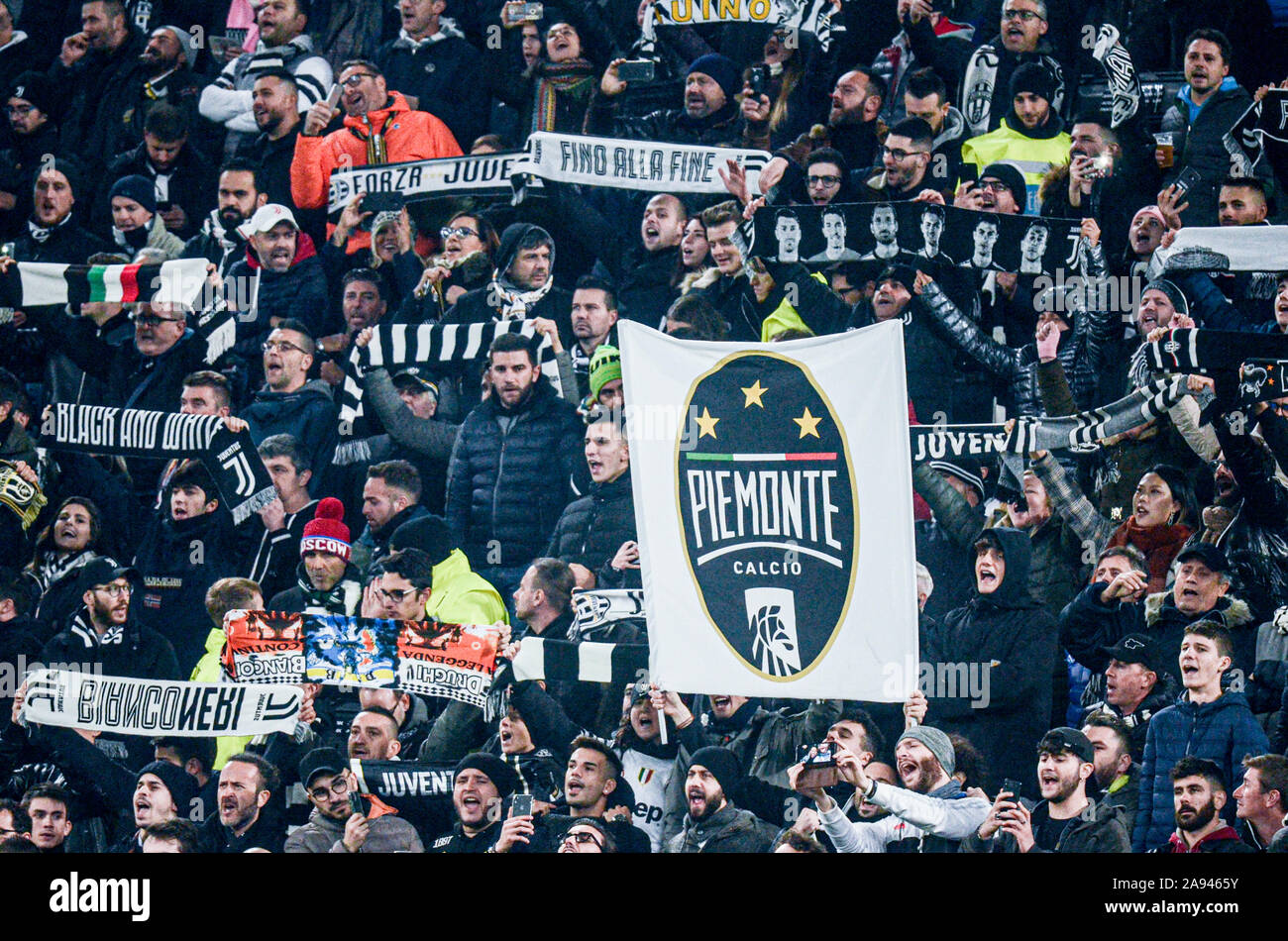 Juventus Supporter Show An Banner With The Logo Of Piemonte