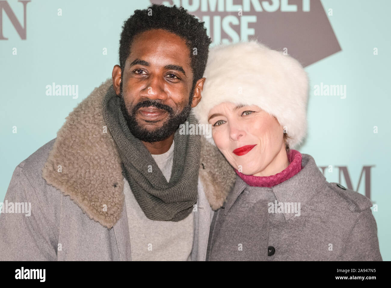 Somerset House, London, UK, 12th November 2019. Olivia Williams and partner Rashan Stone, both actors. Celebrity arrivals on the red carpet for the annual opening of the Somerset House ice rink, sponsored by Fortnum and Mason. Credit: Imageplotter/Alamy Live News Stock Photo