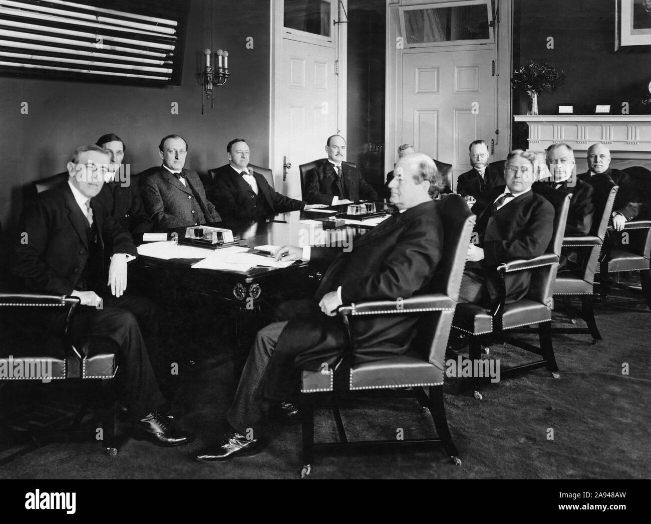 U.S. President Woodrow Wilson (far left) and his Cabinet Members Seated around Table, Washington, D.C., USA, Photograph by Barnett McFee Clinedinst, 1913 Stock Photo