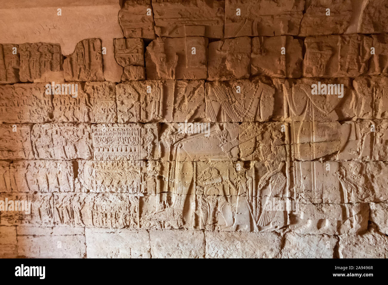 Bas-reliefs in the interior of a reconstructed chapel in the Northern Cemetery at Begarawiyah, containing 41 royal pyramids of the monarchs who rul... Stock Photo