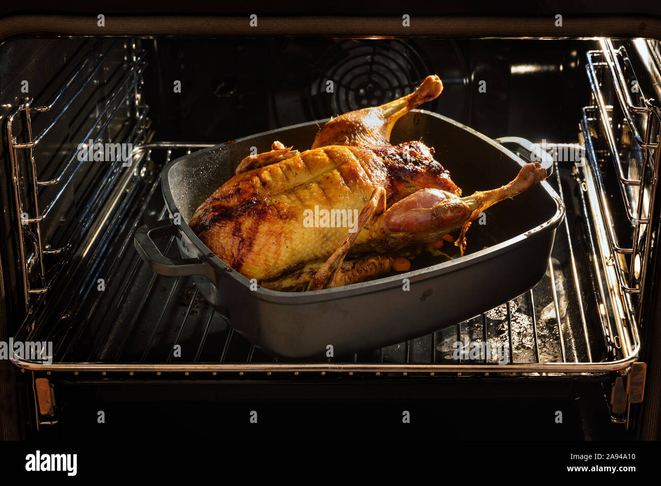 View in the oven, roasted whole duck nearly ready to eat at a festive