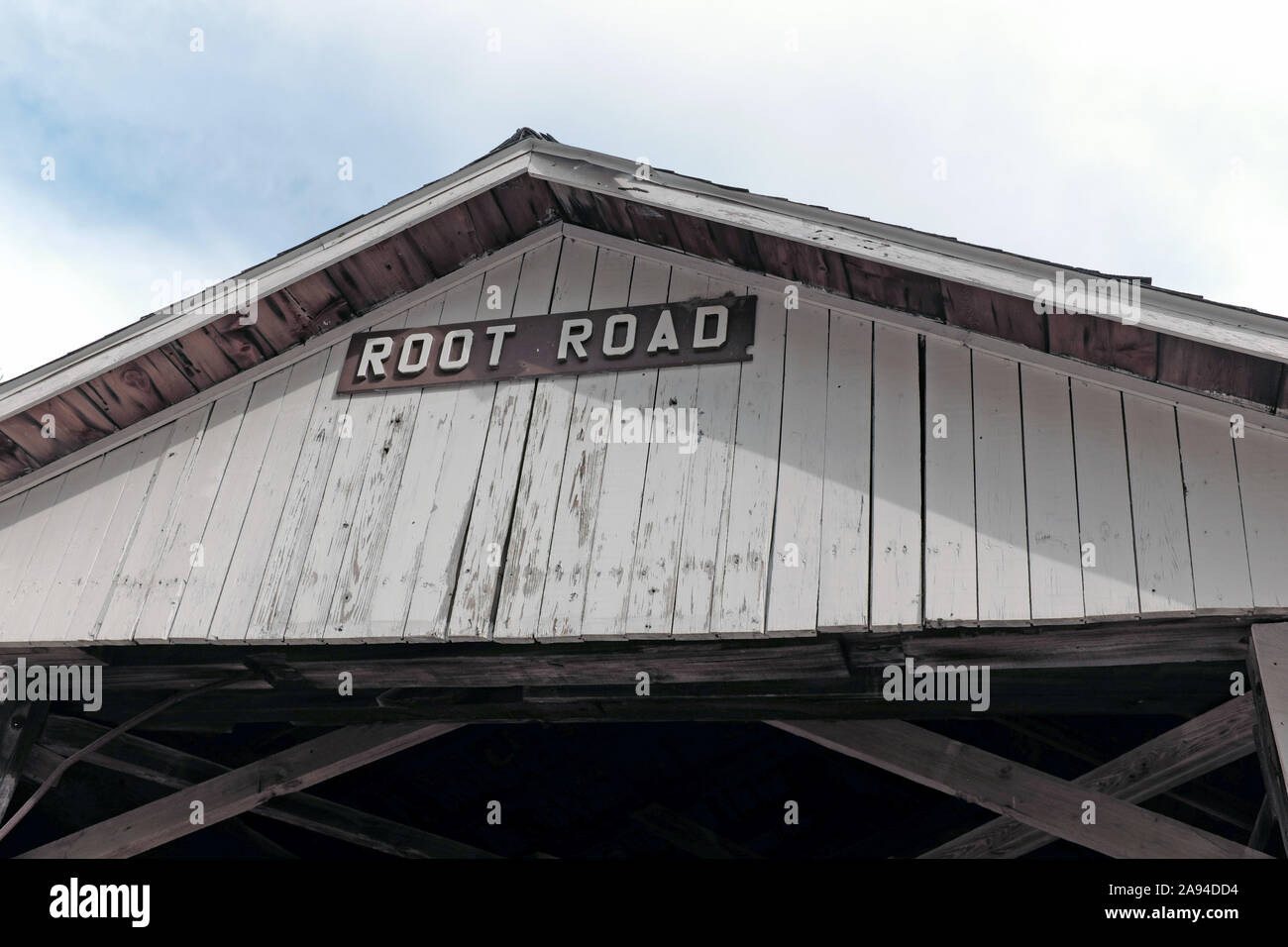 The Root Road Bridge is one of 19 wooden covered bridges in Ashtabula County in Northeast Ohio USA. Stock Photo