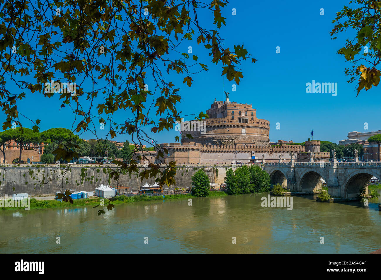 Sant'Angelo Castle  framed by the tree in Rome, Italy Stock Photo