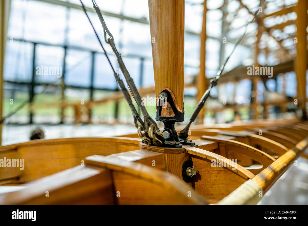 Mounting and tensioning mechanism of the wooden structure with threaded braces and flexible bushings with locks as a metaphor for the reliability and Stock Photo