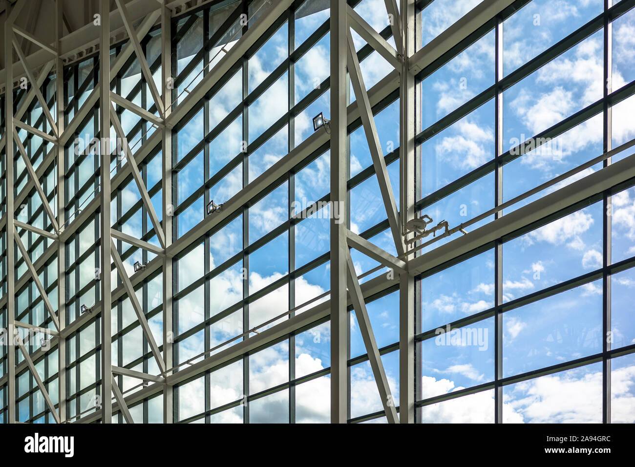 The glass wall with a metal frame supporting the structure for glass blocks  allows a large amount of light to penetrate into the room, creating the ef  Stock Photo - Alamy