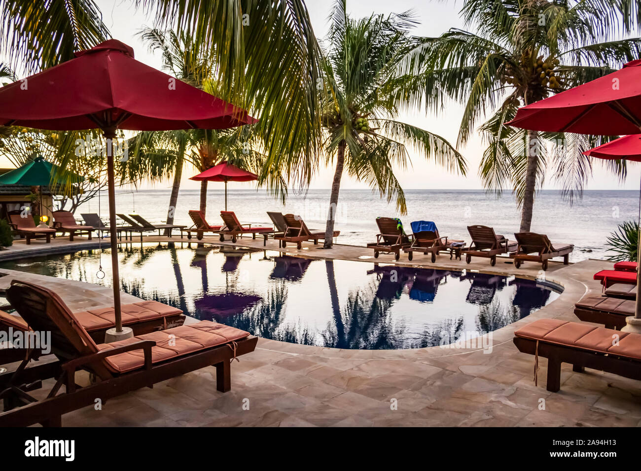 Swimming pool at a resort; Amed, Bali, Indonesia Stock Photo