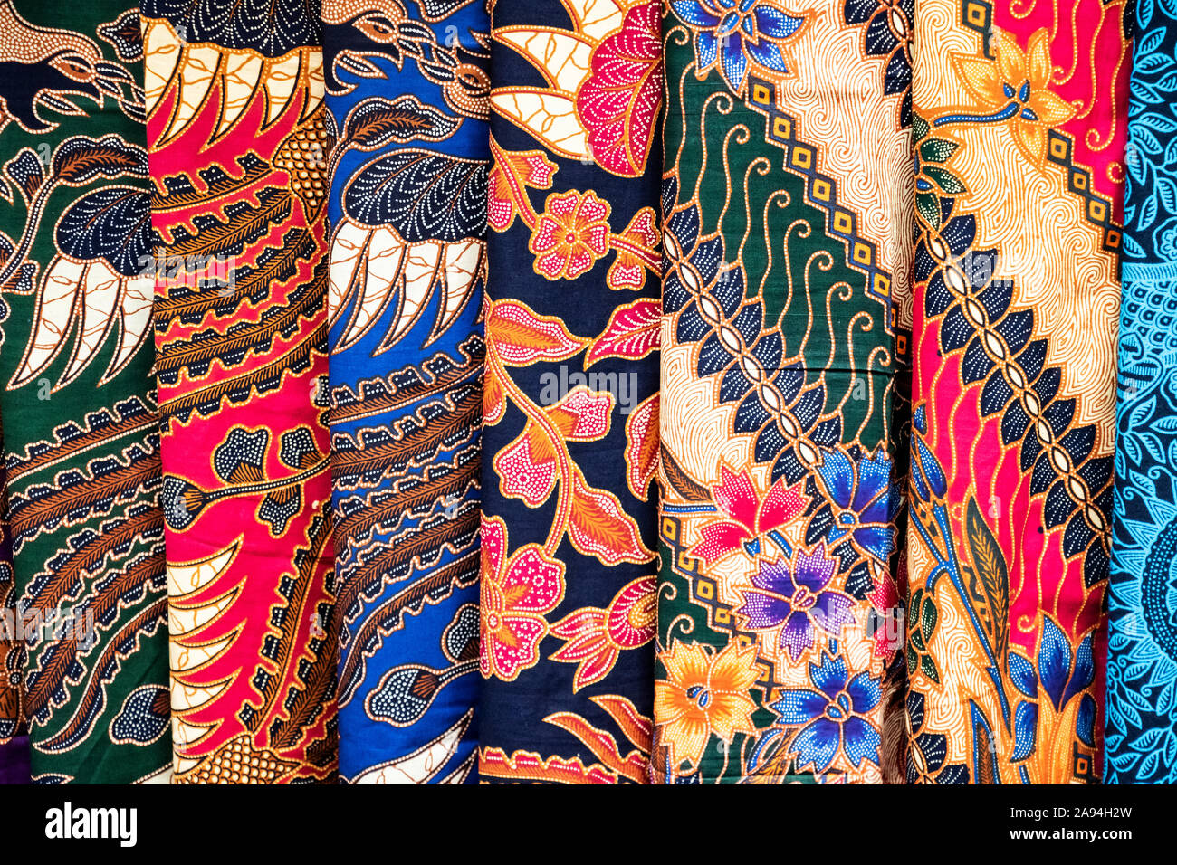 Batik cloth with bright colours and patterns; Banjar, Bali, Indonesia Stock Photo