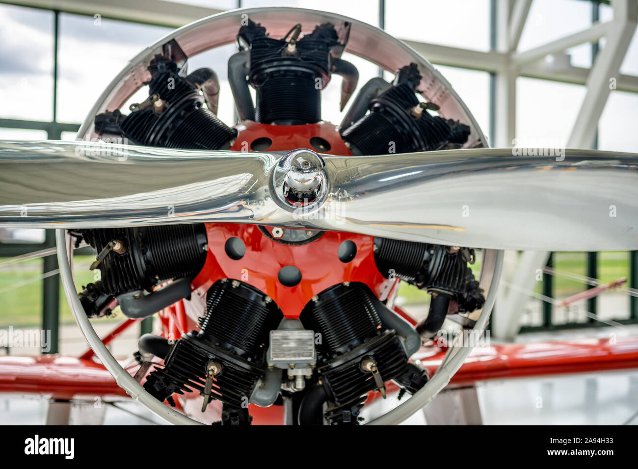 The front of the old classic aircraft engine with a shaft with