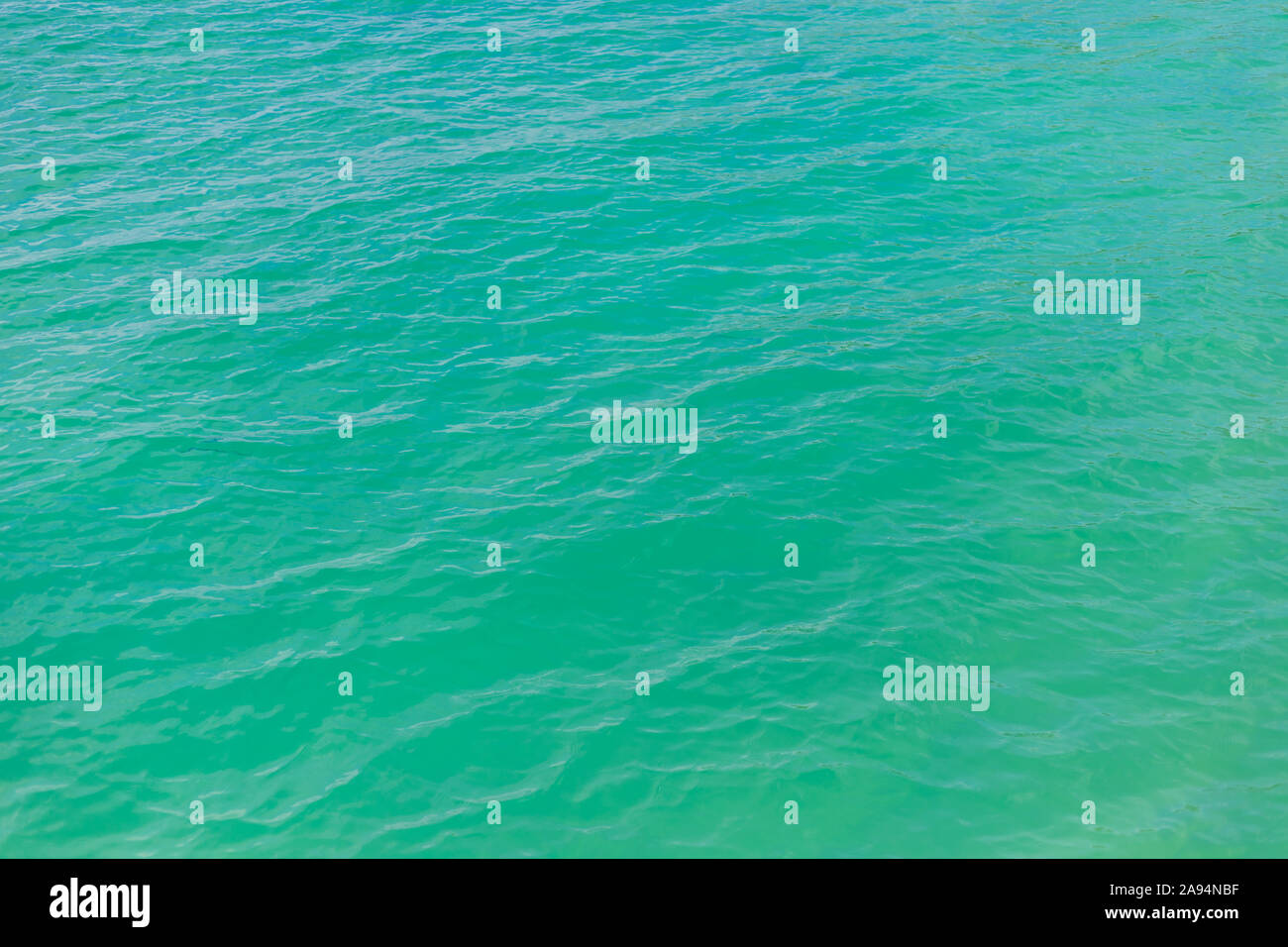 Beautiful blue sea water surface texture background Stock Photo - Alamy