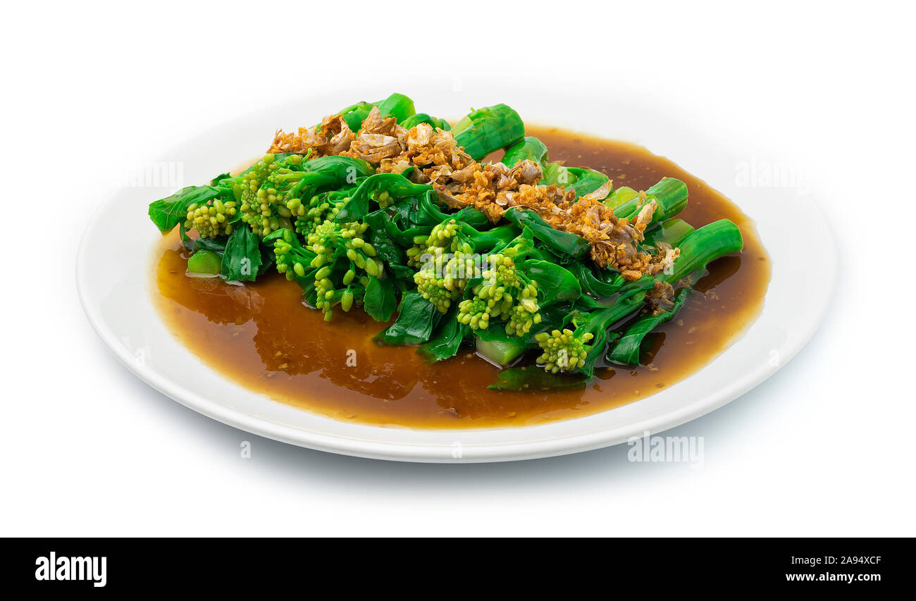 Stir Fried Chinese kale in Oyster sauce ontop with Crispy Garlic Goodtasty  Of Food. Asian Food Dish Vegetarian Style side view Stock Photo - Alamy | 
