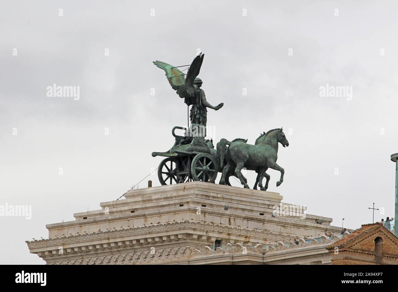 statue of the goddess Victoria on a building called L'altare della patria or the Vittorio