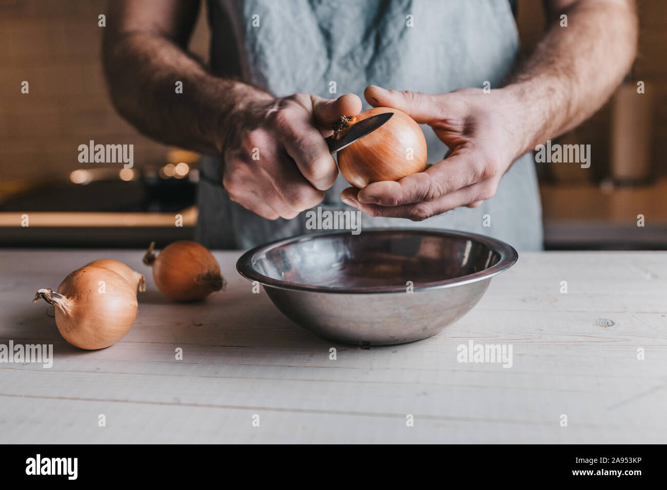 Atmospheric picture of cooking in the rural style - rough male hands at ...