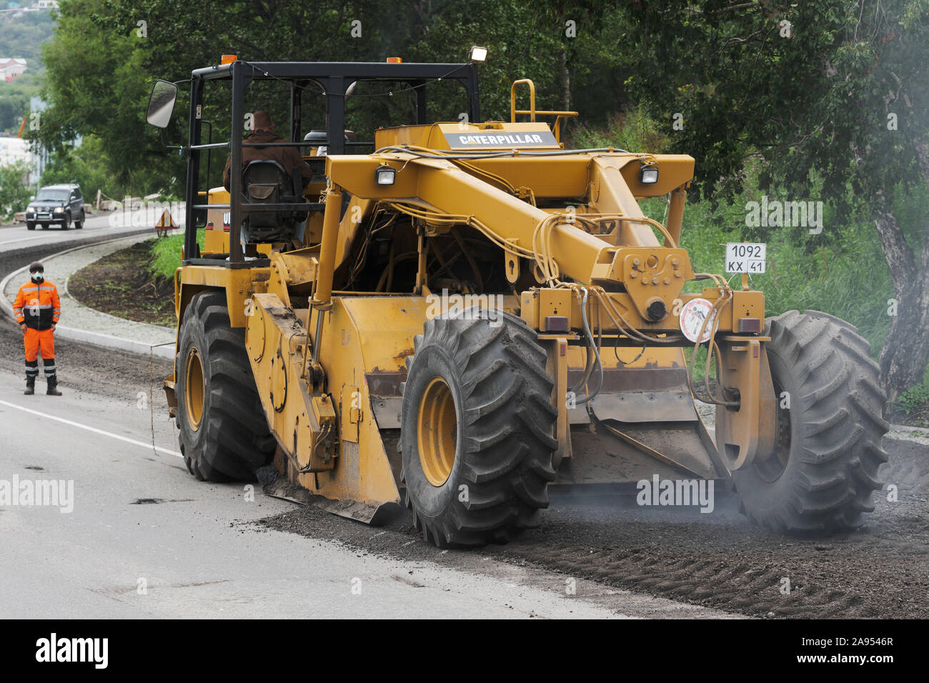 Allwheel drive road reclaimer Caterpillar in action roadwork asphalt