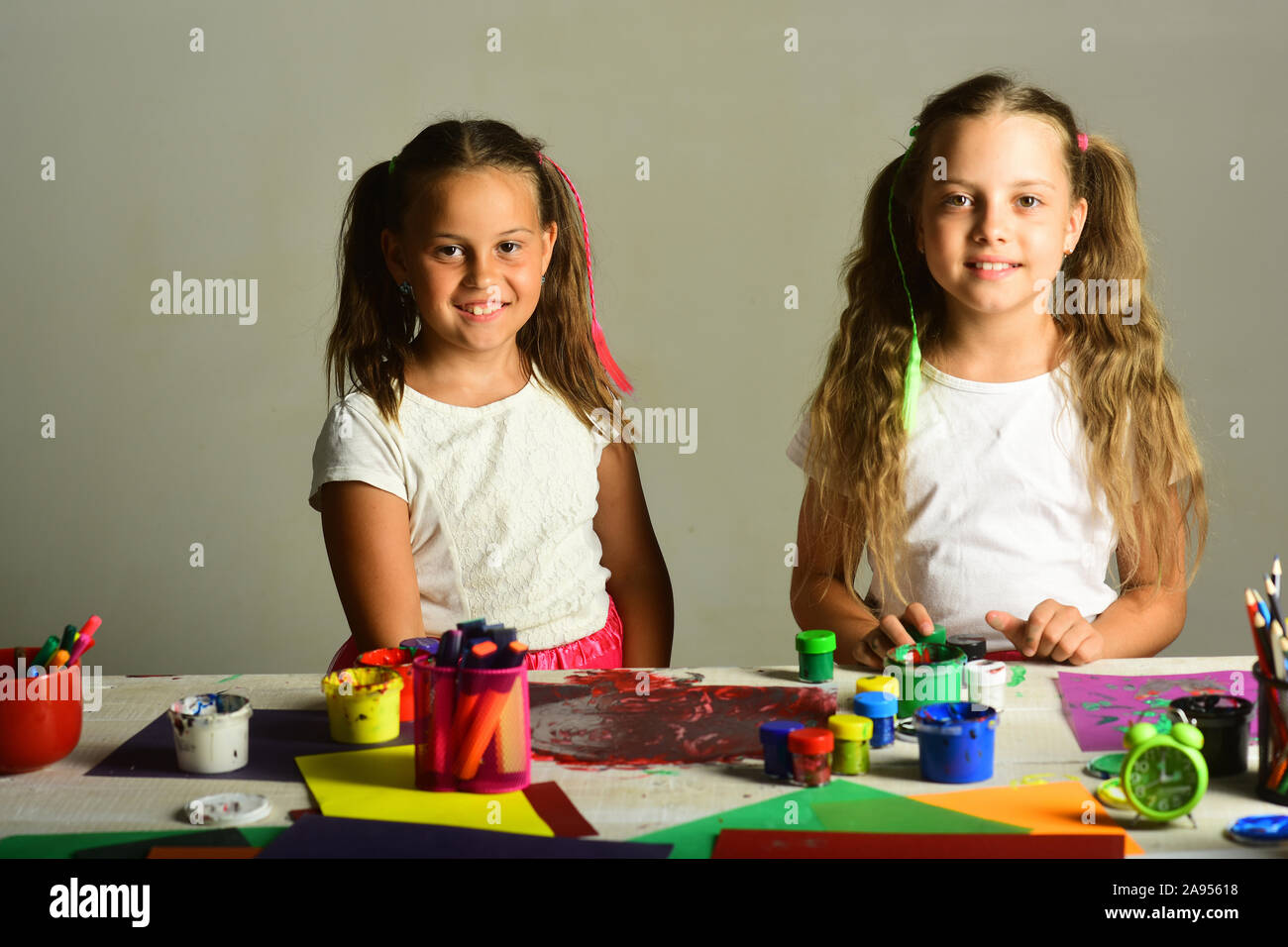 Girls With Smiling Faces By Their Art Desk Children Paint With