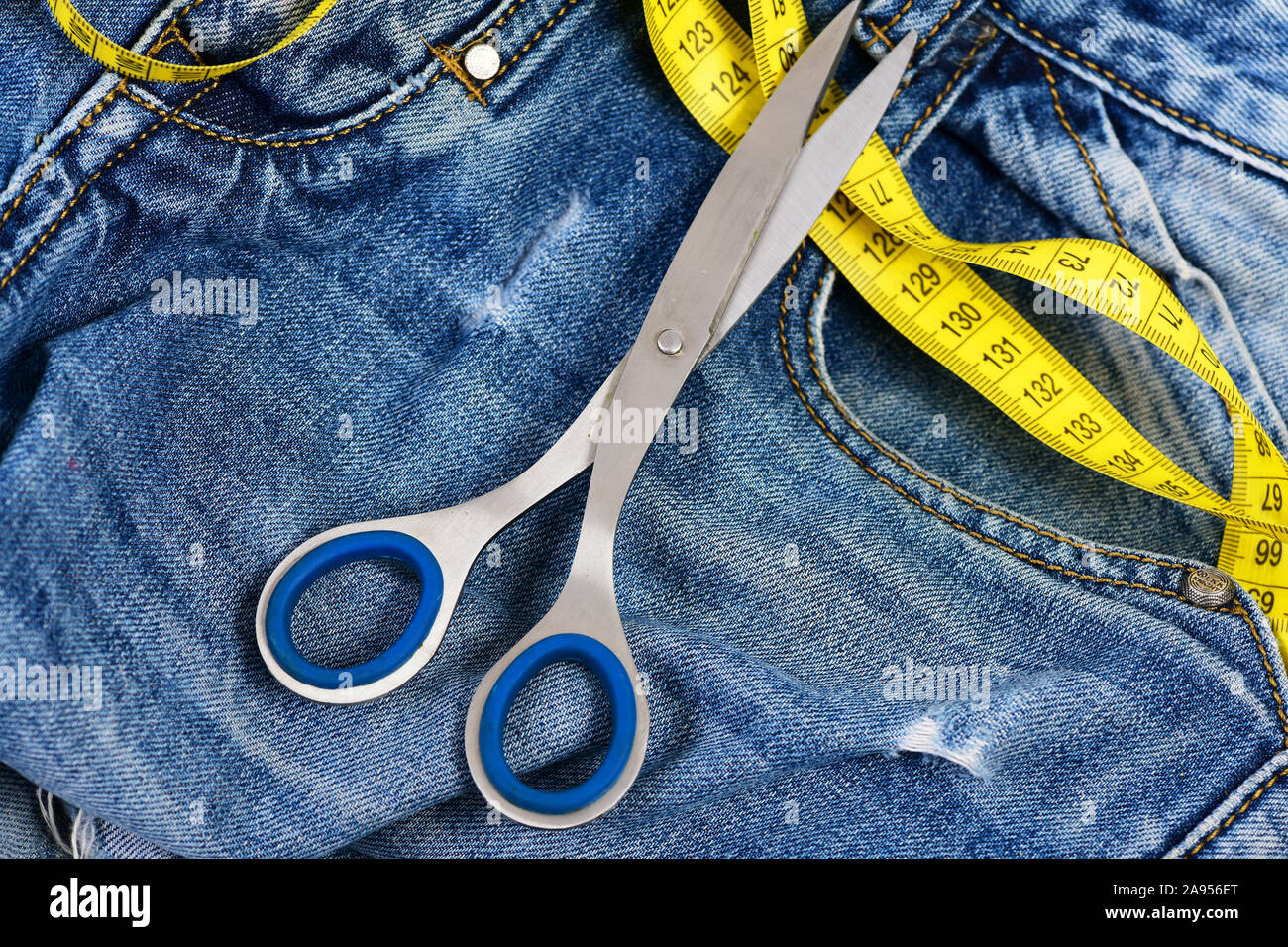 Blue tailors tape measure hi-res stock photography and images - Alamy