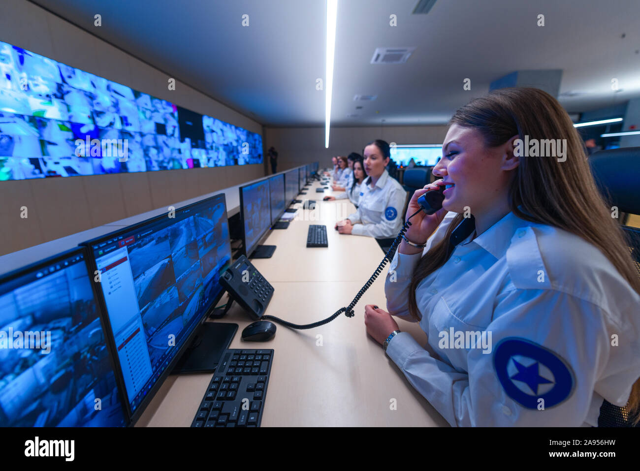 Technical Operator Works at His Workstation with Multiple Displays ...