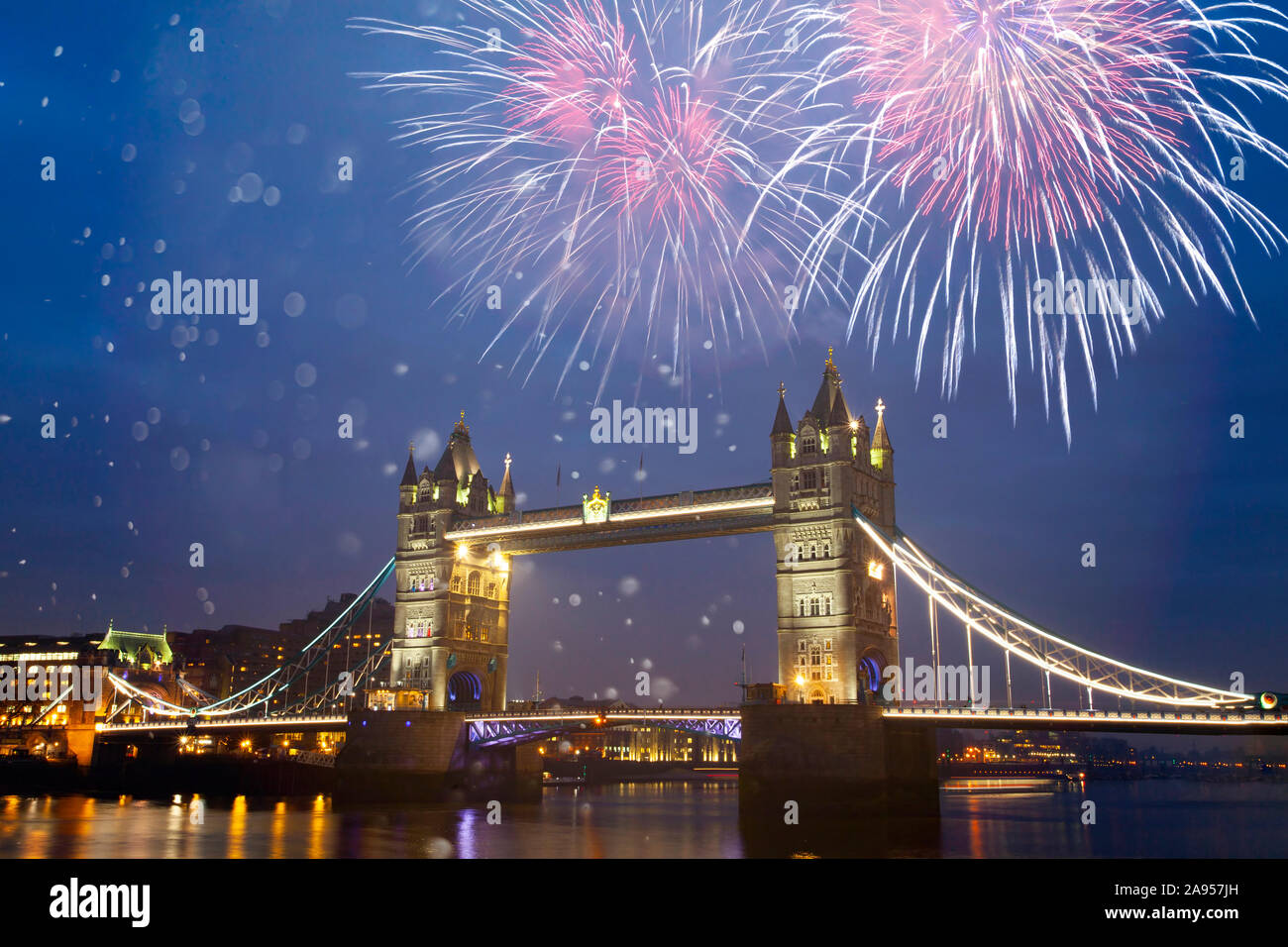 Celebratory fireworks over Tower Bridge - New Year destination. London. UK Stock Photo