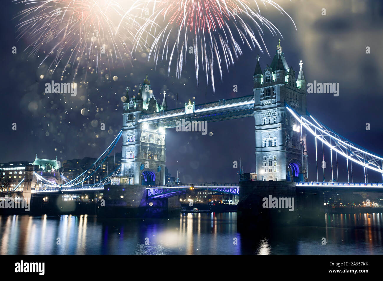 Celebratory fireworks over Tower Bridge - New Year destination. London. UK Stock Photo
