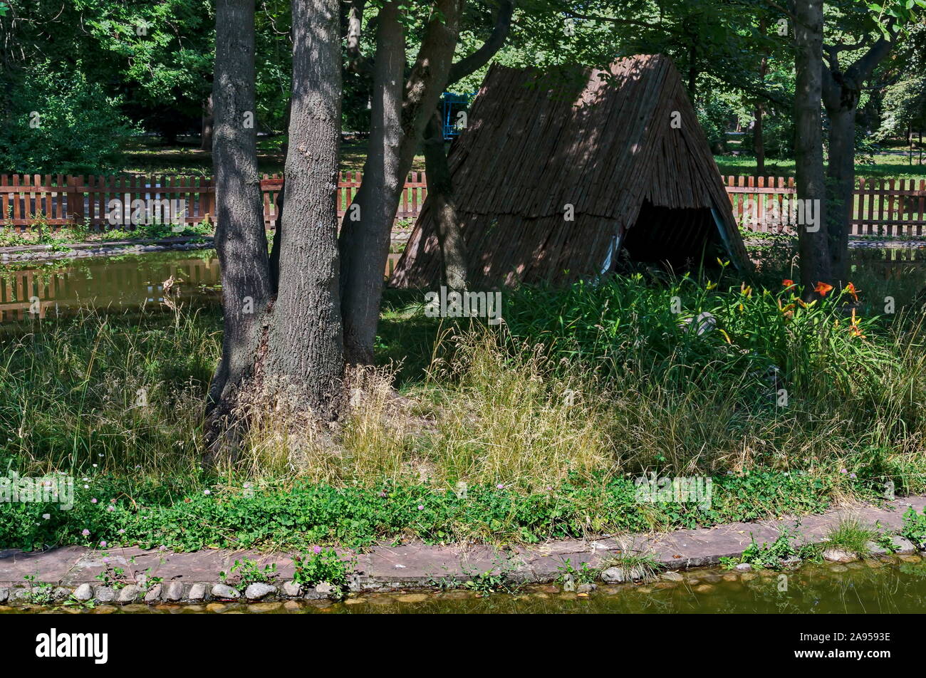 A small house built into the lake with nesting place for ducks in the city garden, Sofia, Bulgaria Stock Photo