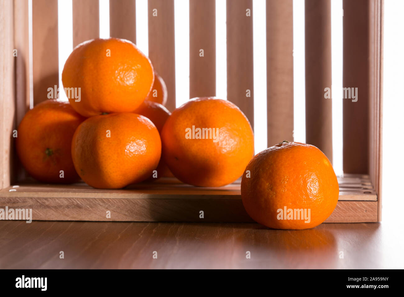 Tangerines or oranges, mandarins, clementines, citrus fruits in a