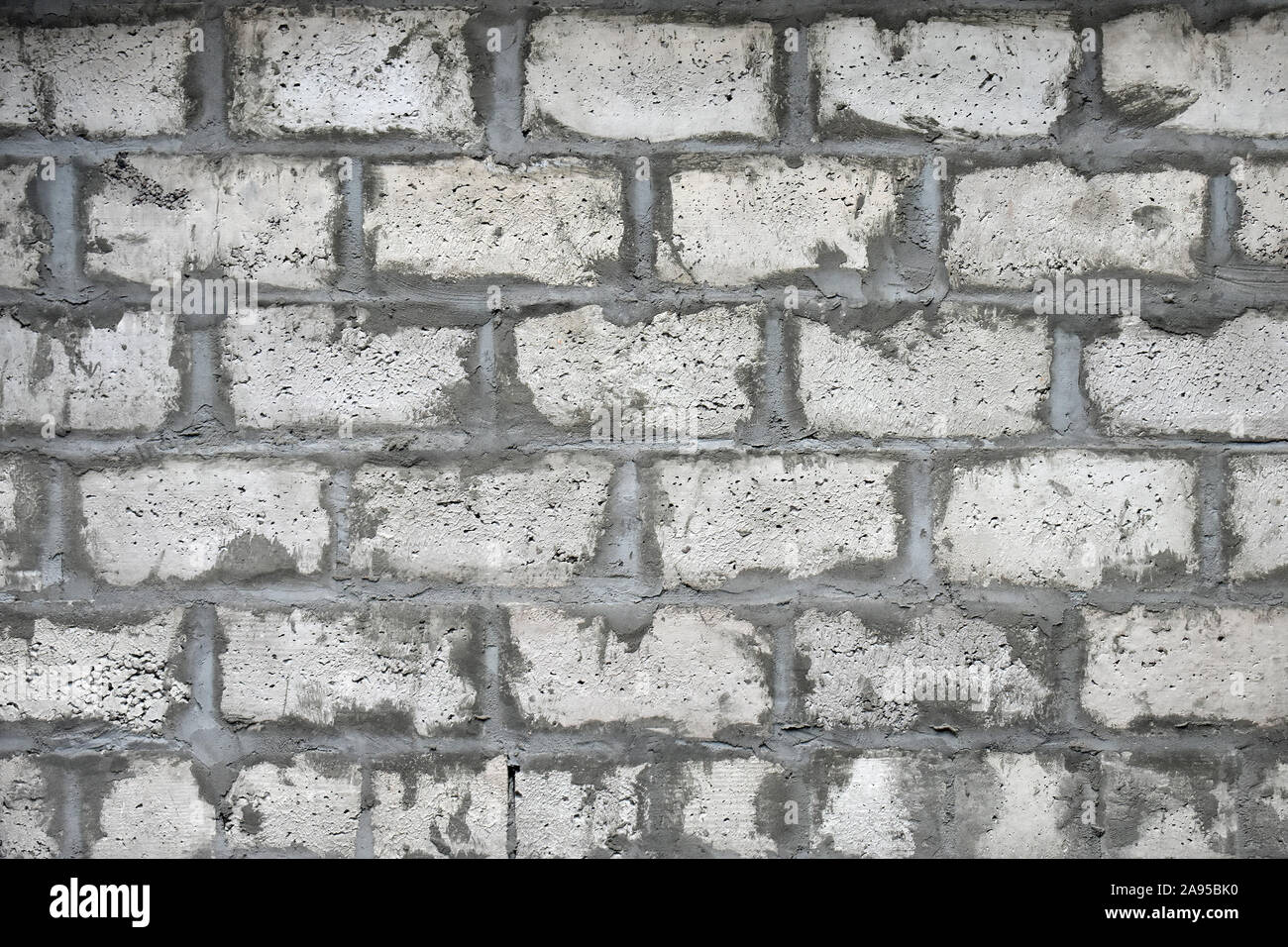 Texture: gray wall with bricks made from expanded clay and concrete - background Stock Photo