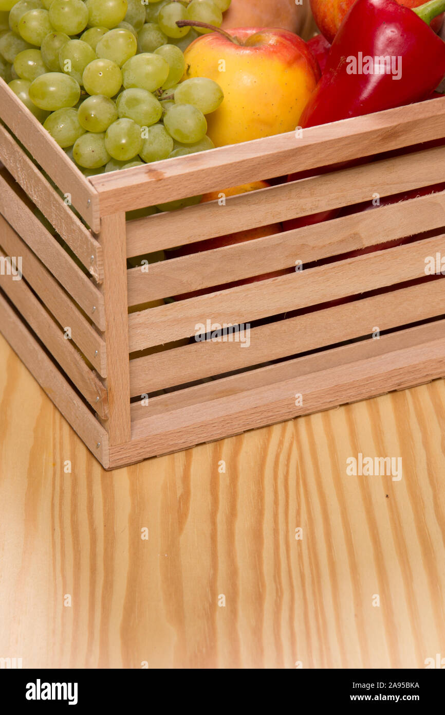 Fresh ripe fruit grapes and apples in box Stock Photo - Alamy