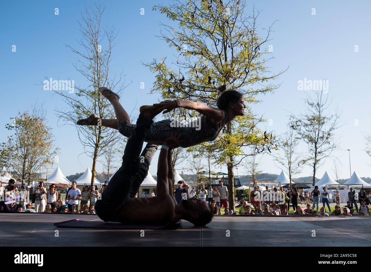 Couple dancing at the main stage of the Wanderlust festival, in Lisbon, Portugal. Stock Photo