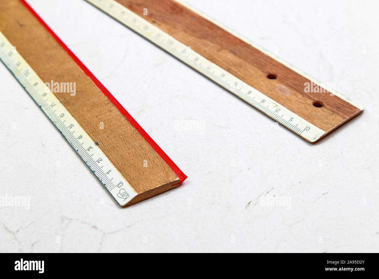 wooden rulers on a white background Stock Photo
