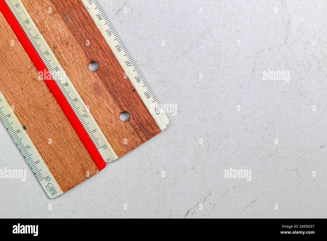 wooden rulers on a white background Stock Photo