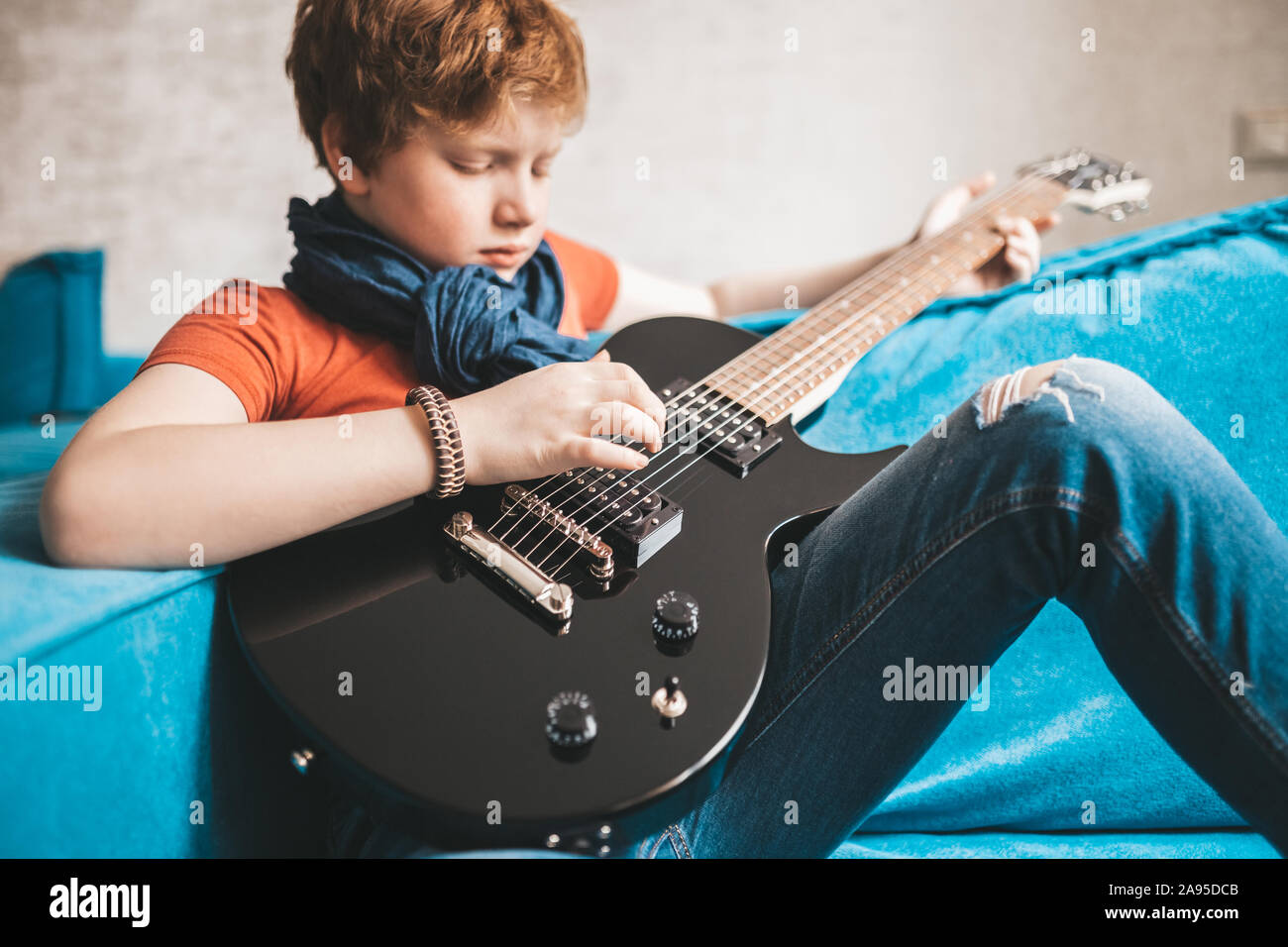 Rock and roll kid guitar player Stock Photo Alamy