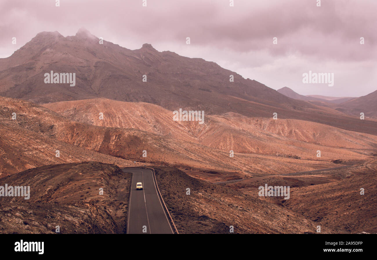 Driving through a mountain road in Fuerteventura Stock Photo