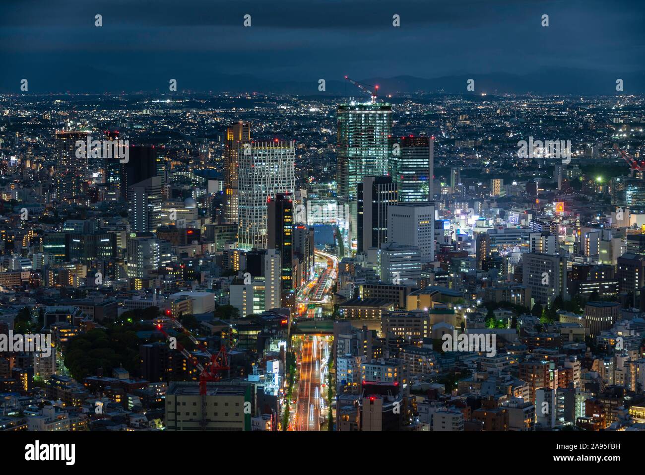 View from Roppongi Hills to sea of houses, city view at night, skyscrapers, Tokyo, Japan Stock Photo