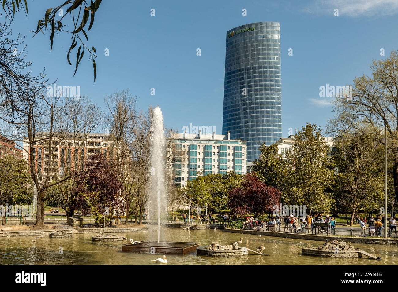 Doña Casilda Iturrizar park, also known as 'Parque de los Patos', is an urban park created in 1907 in Bilbao, Spain. Iberdrola Tower in background. Stock Photo
