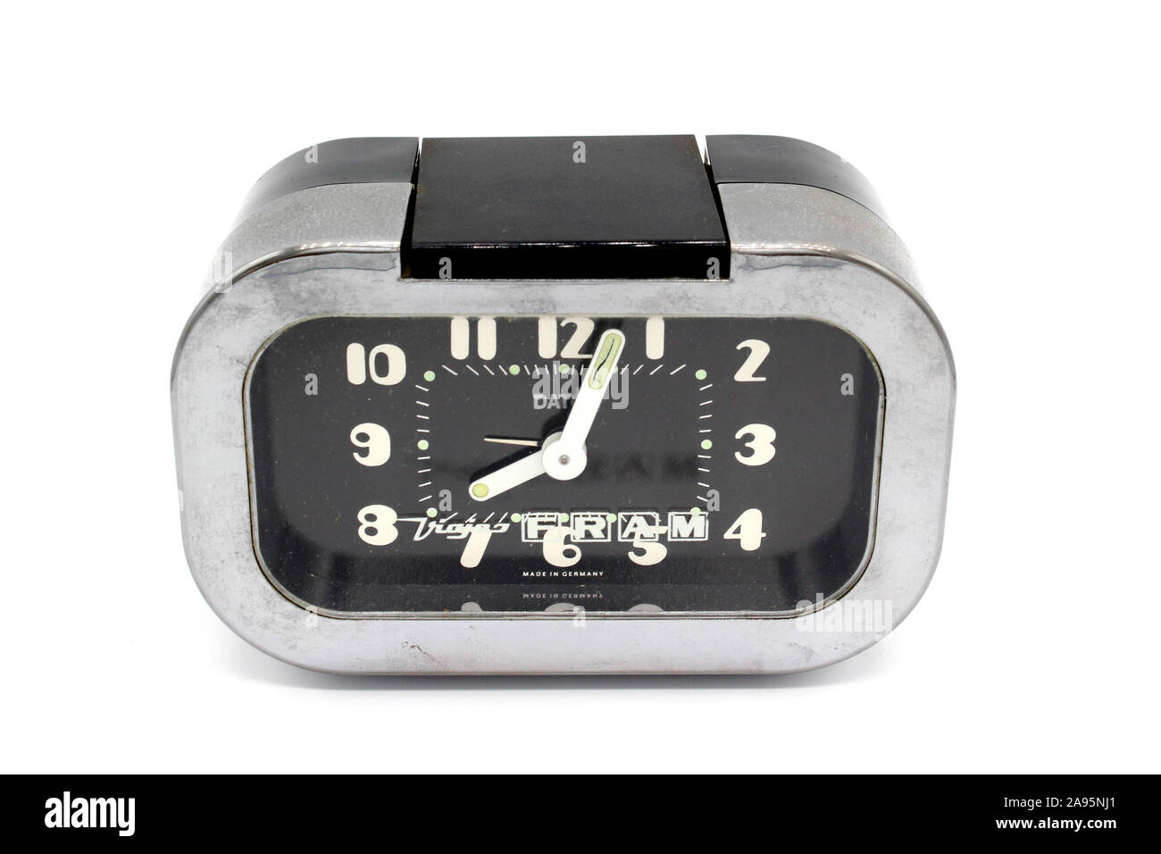 Vintage plastic alarm clock, made in Germany, isolated on white