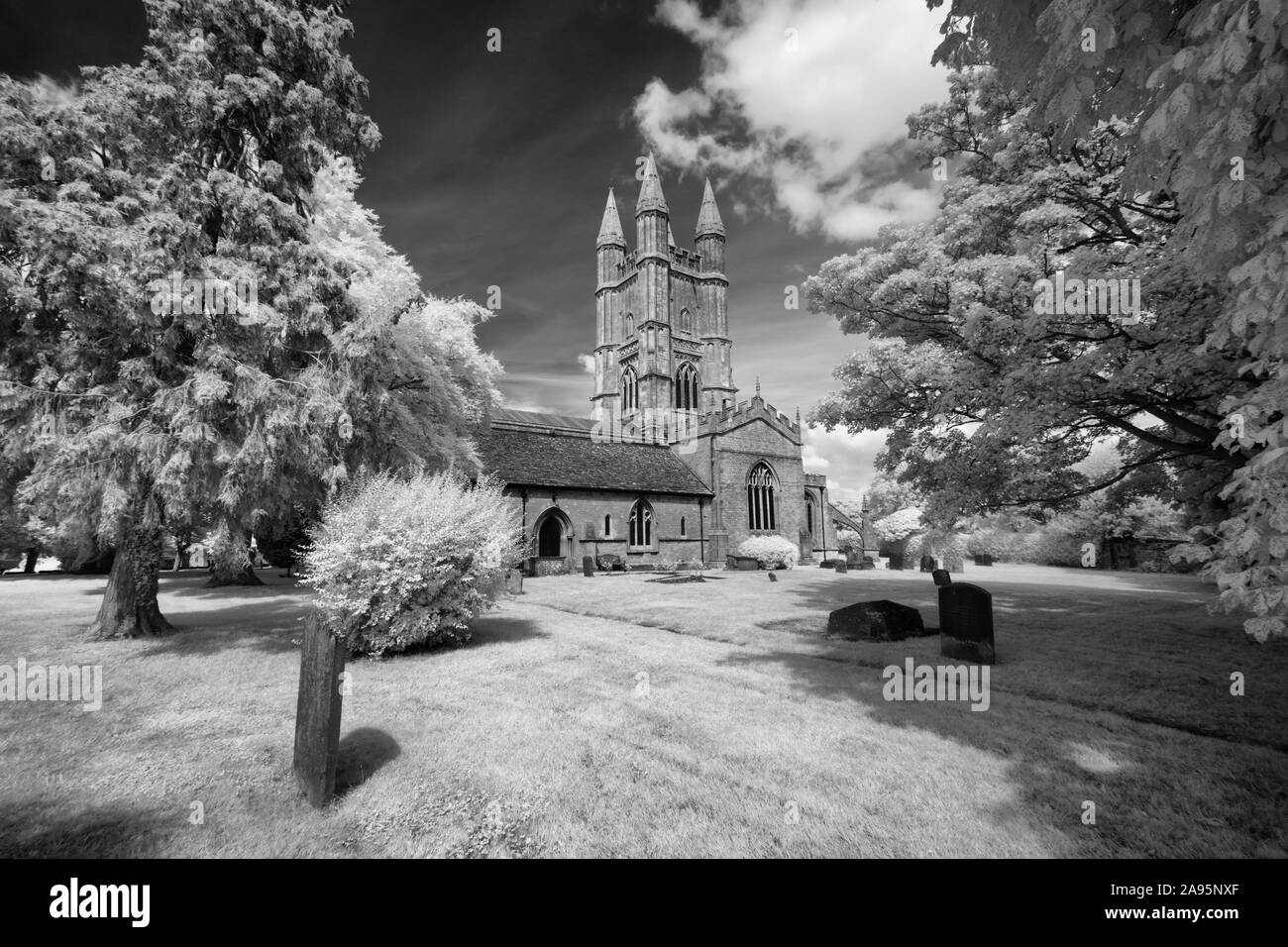 St Sampson's parish church and churchyard in the Wiltshire town of Cricklade Stock Photo