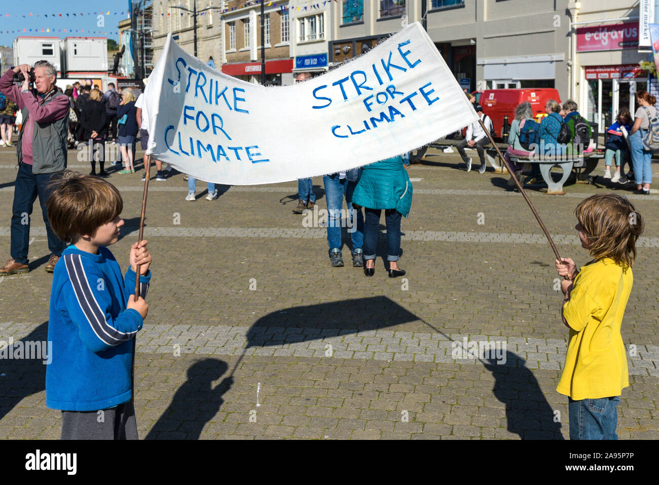 Children participating in the Extinction Rebellion climate strike in Truro City City in Cornwall. Stock Photo