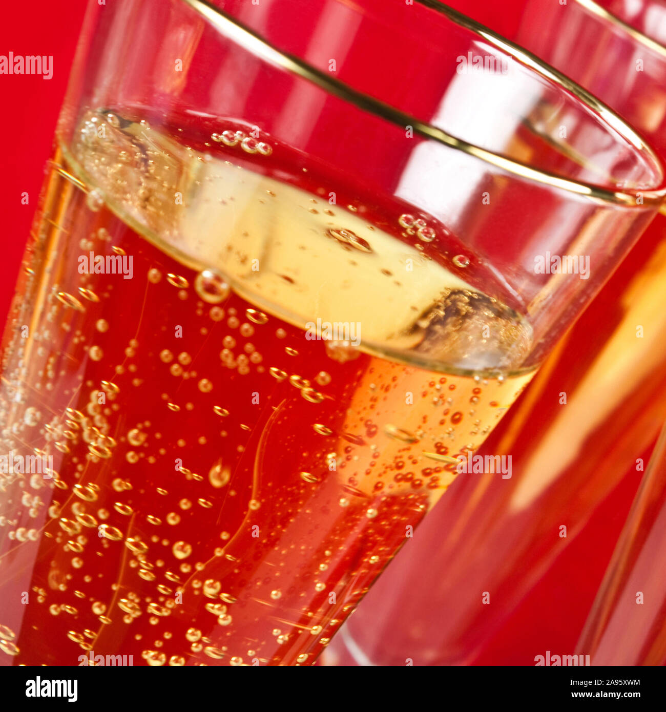 Champagne and red background Stock Photo - Alamy
