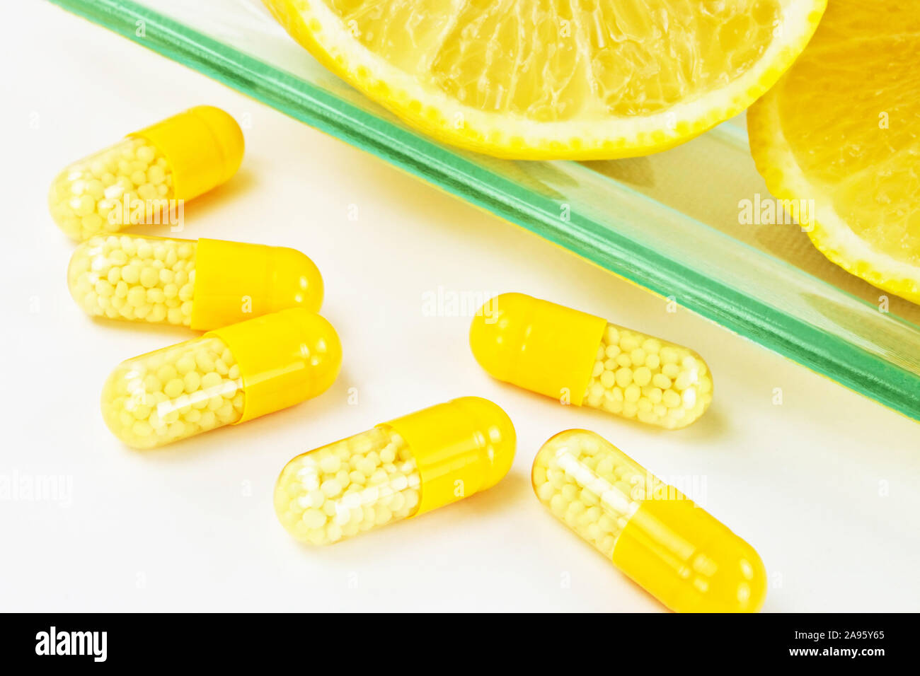 Vitamin c pills and lemons Stock Photo Alamy