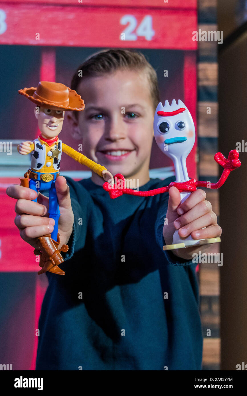 London, UK. 13th Nov, 2019. Toy Story 4 True Talkers by Mattel  with Charlie, 10 - Toy Retailer’s Association reveal the 2019 DreamToys list. Credit: Guy Bell/Alamy Live News Stock Photo
