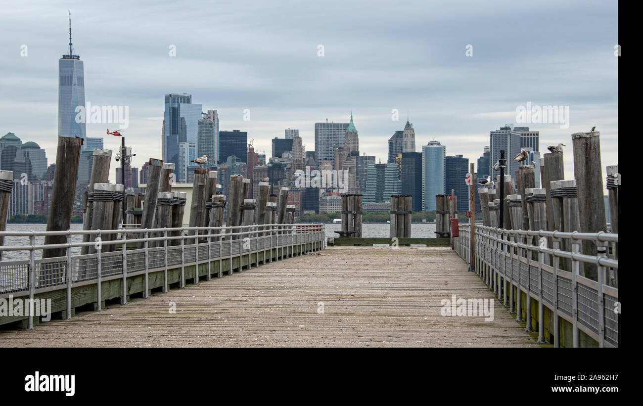 USA, New York, Liberty Island - May 2019:View of downtown Manhattan from old dock on Liberty Island Stock Photo