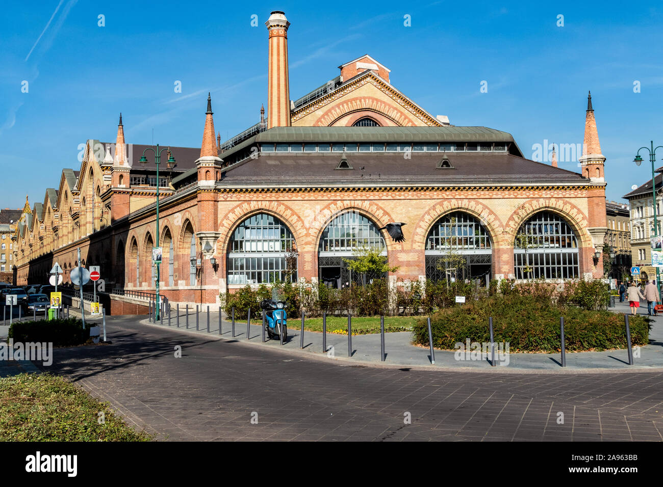Budapest central market hall. Restored neogothic hall for traders with grocery produce on the ground & souvenirs in Budapest, Hungary Stock Photo