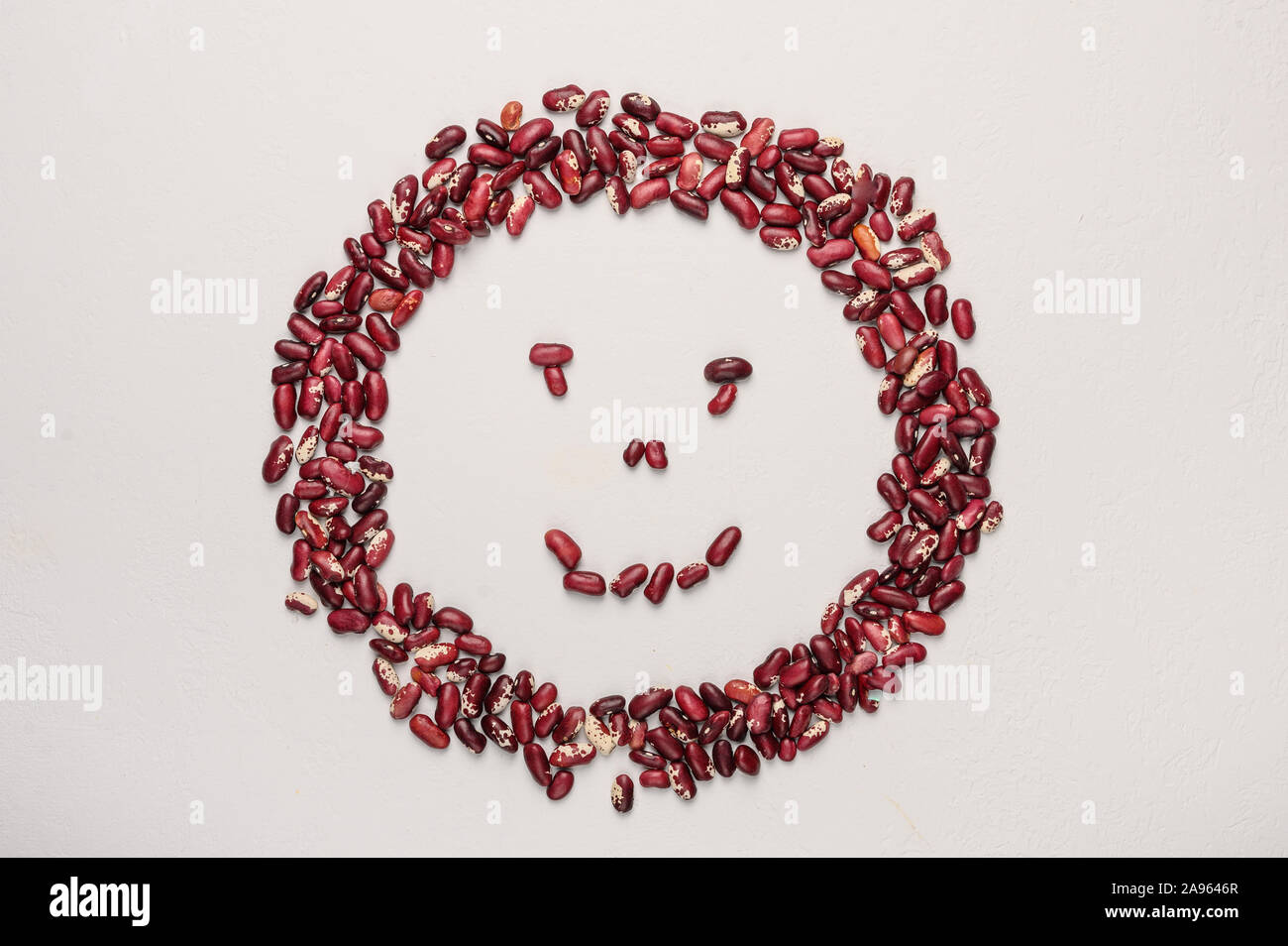Concept of the smiley beans red beans. Healthy diet food Stock Photo